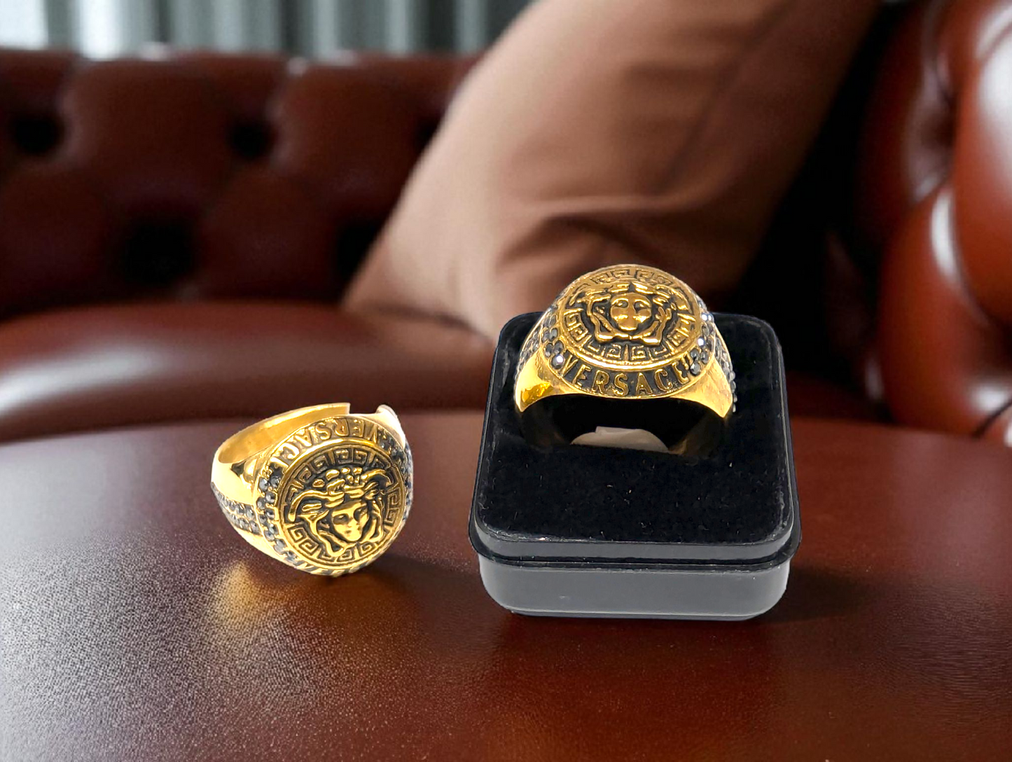 Gold Medusa Crest Ring with Black Stone Accents