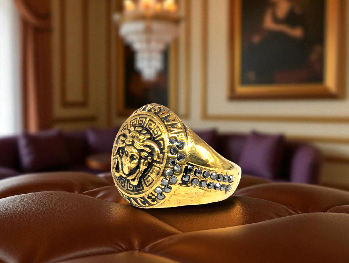 Gold Medusa Crest Ring with Black Stone Accents