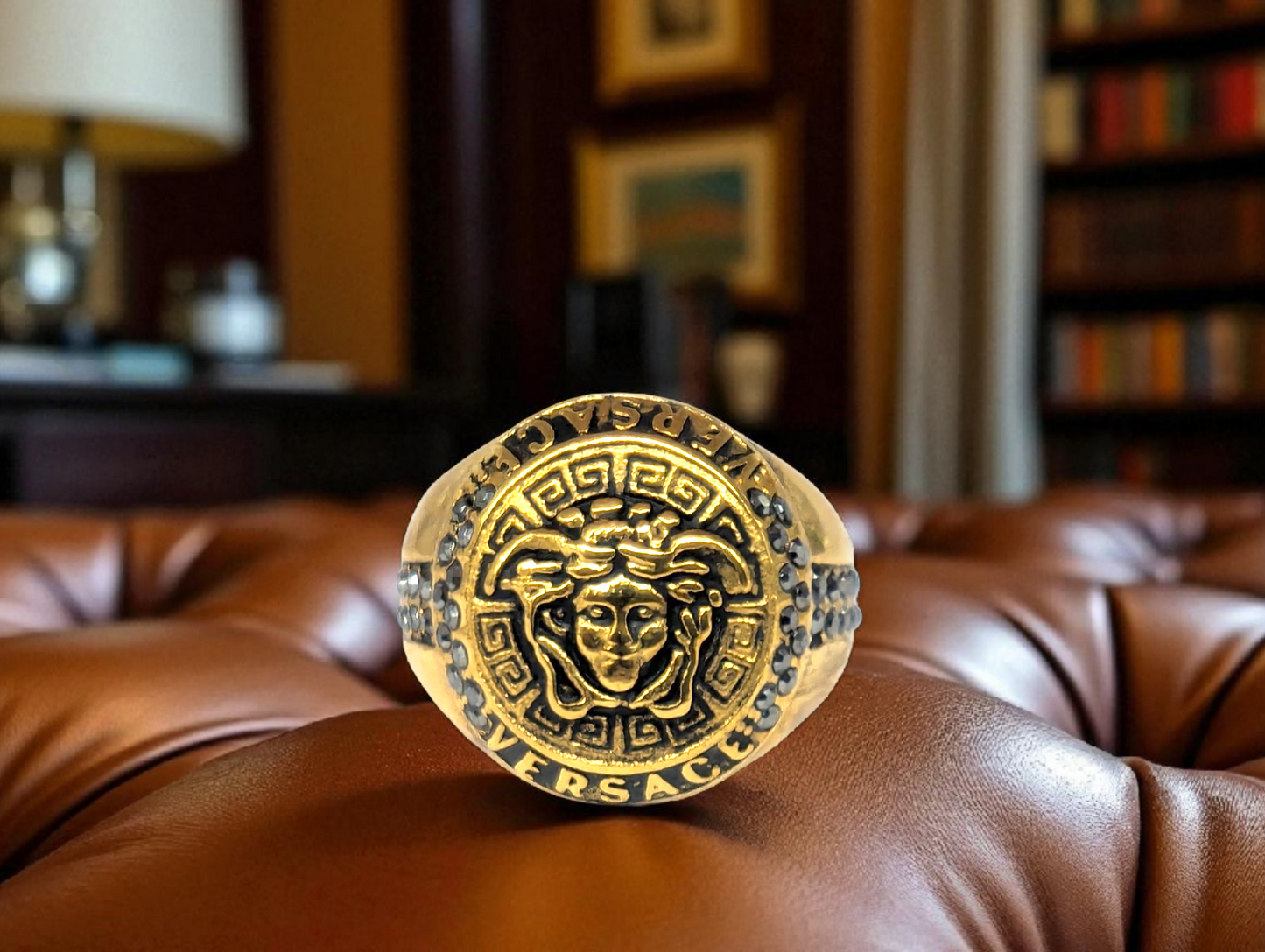 Gold Medusa Crest Ring with Black Stone Accents