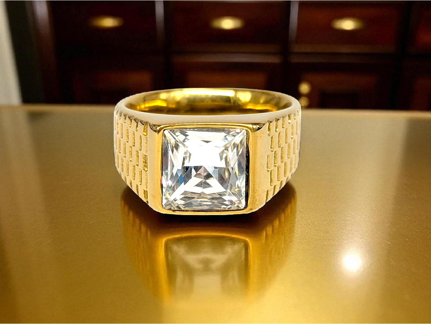 Regal Radiance: Gold Ring with Square-Cut Gemstone