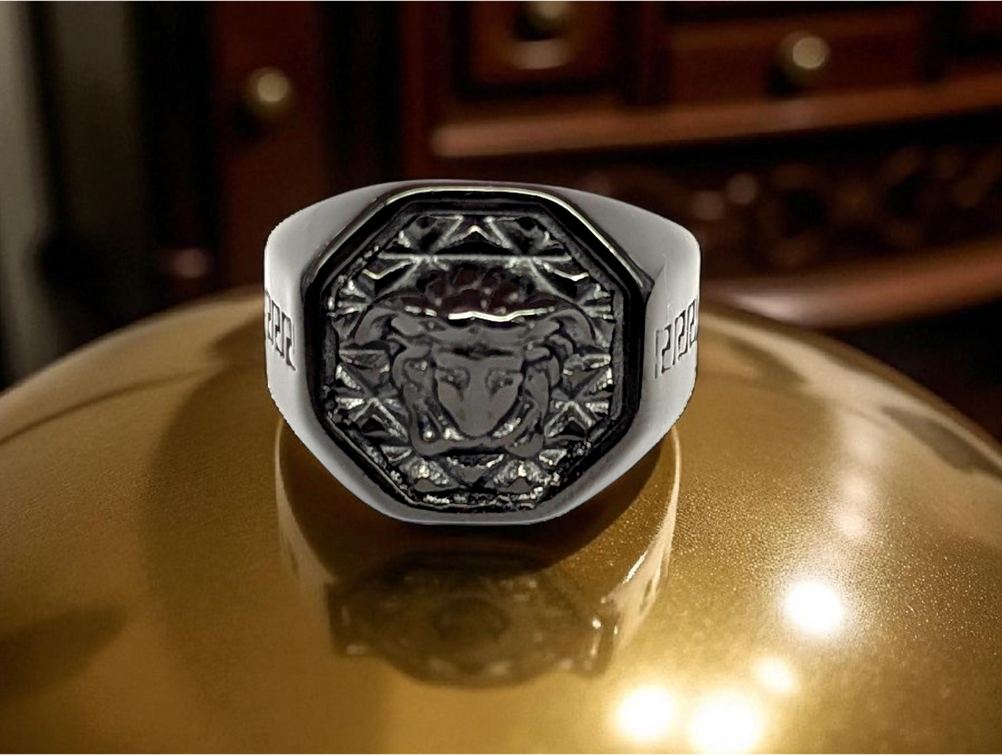 Mythic Power: Black Ceramic Ring with Medusa Emblem