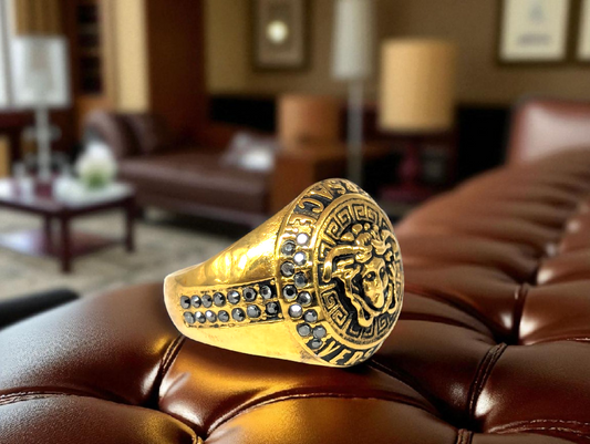 Gold Medusa Crest Ring with Black Stone Accents