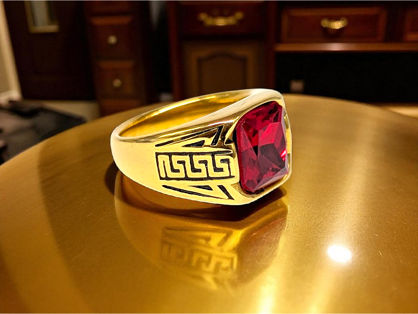 Gold-Tone Ring with Ruby Red Stone