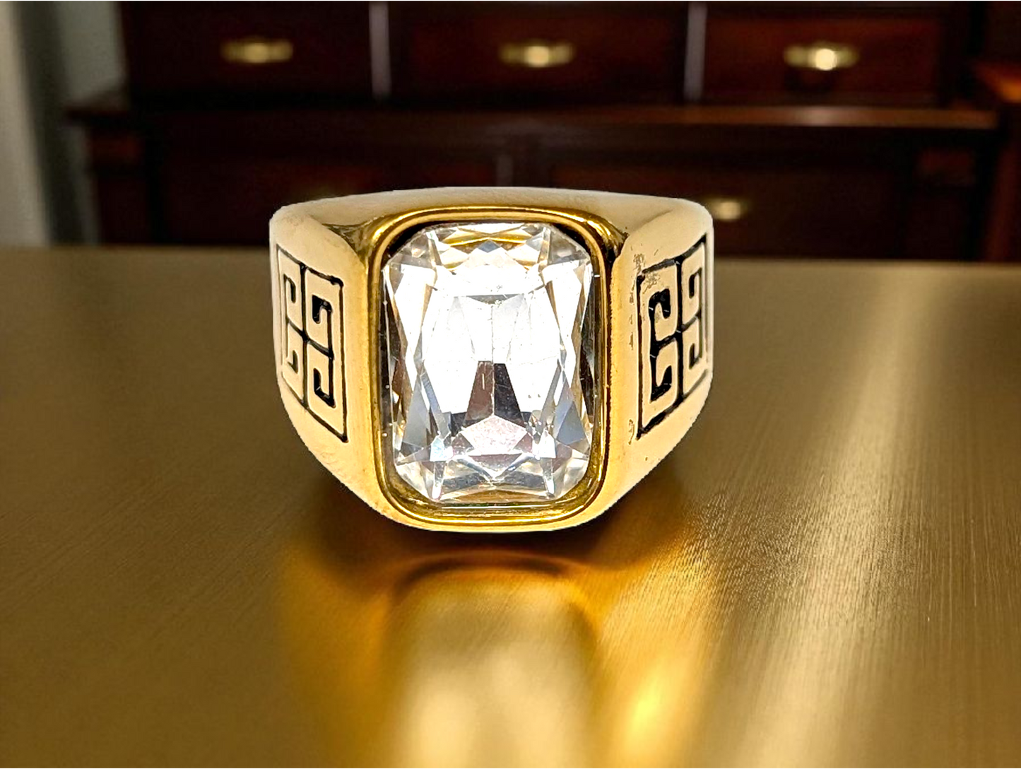 Gold-Tone Ring with Radiant Clear Stone