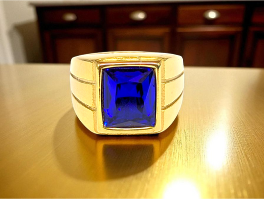 Gold-Tone Ring with Deep Blue Gemstone