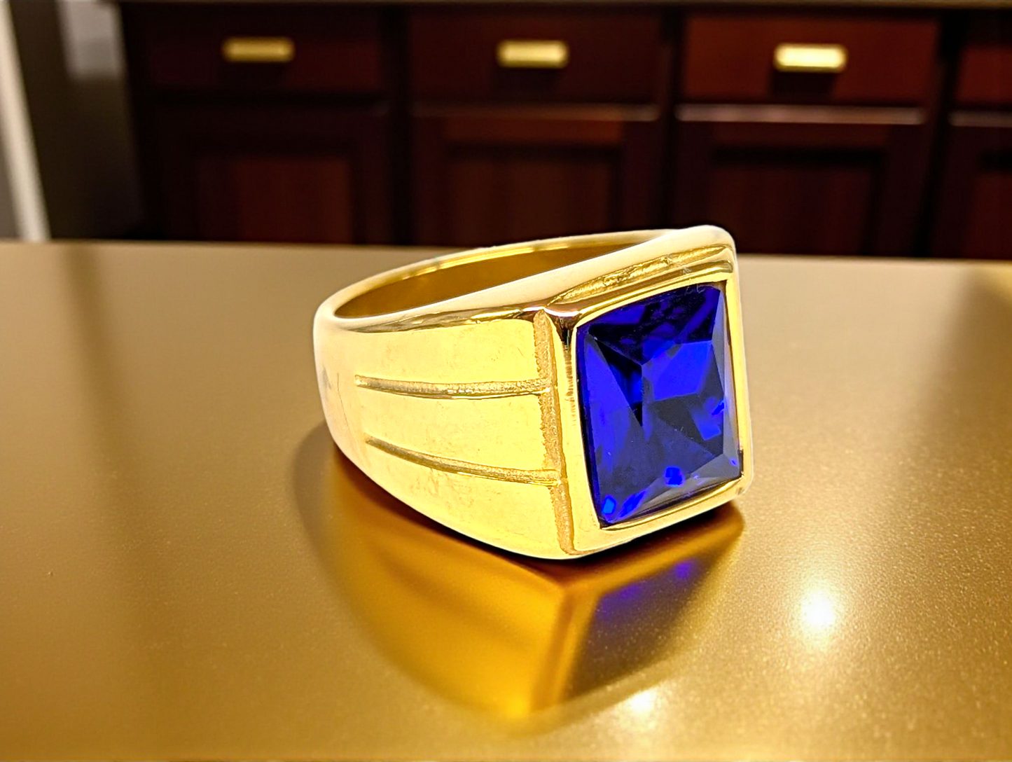 Gold-Tone Ring with Deep Blue Gemstone
