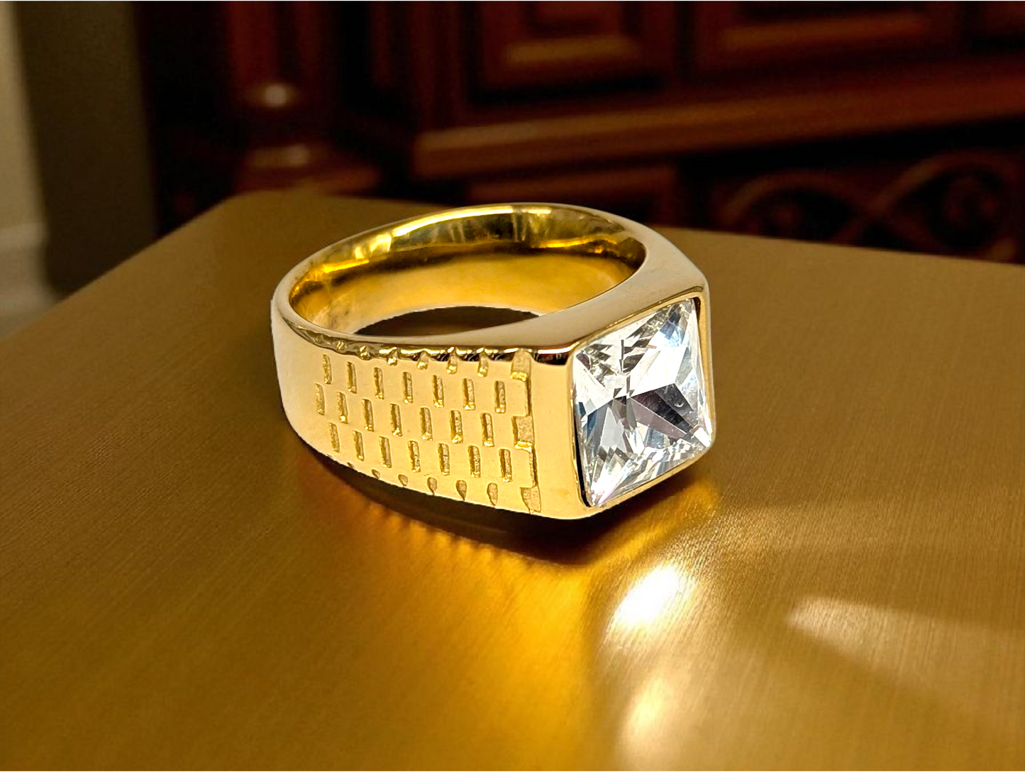 Regal Radiance: Gold Ring with Square-Cut Gemstone