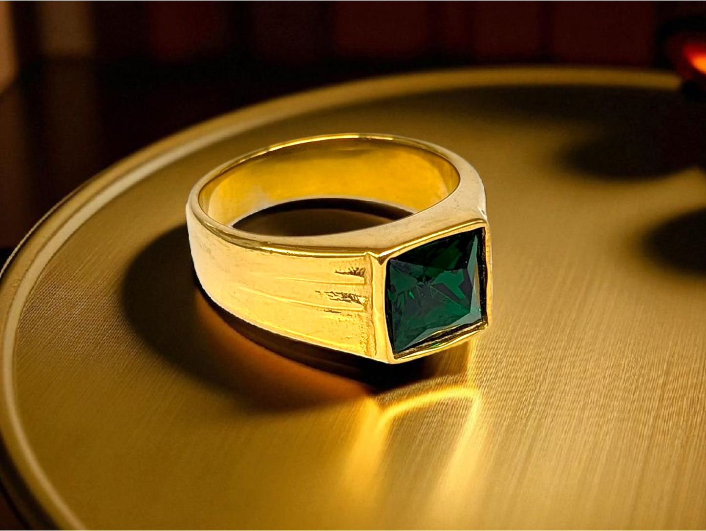 Emerald Elegance: Gold Ring with Rectangular Green Gemstone