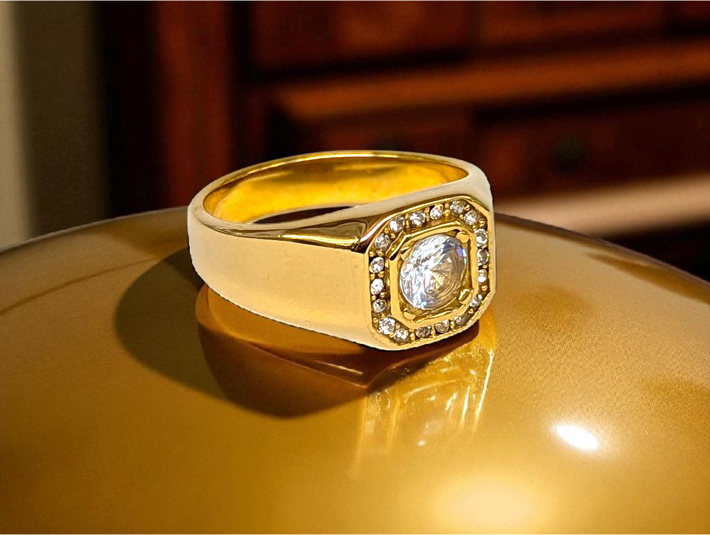 Crown Brilliance: Gold Ring with Round-Cut Stone