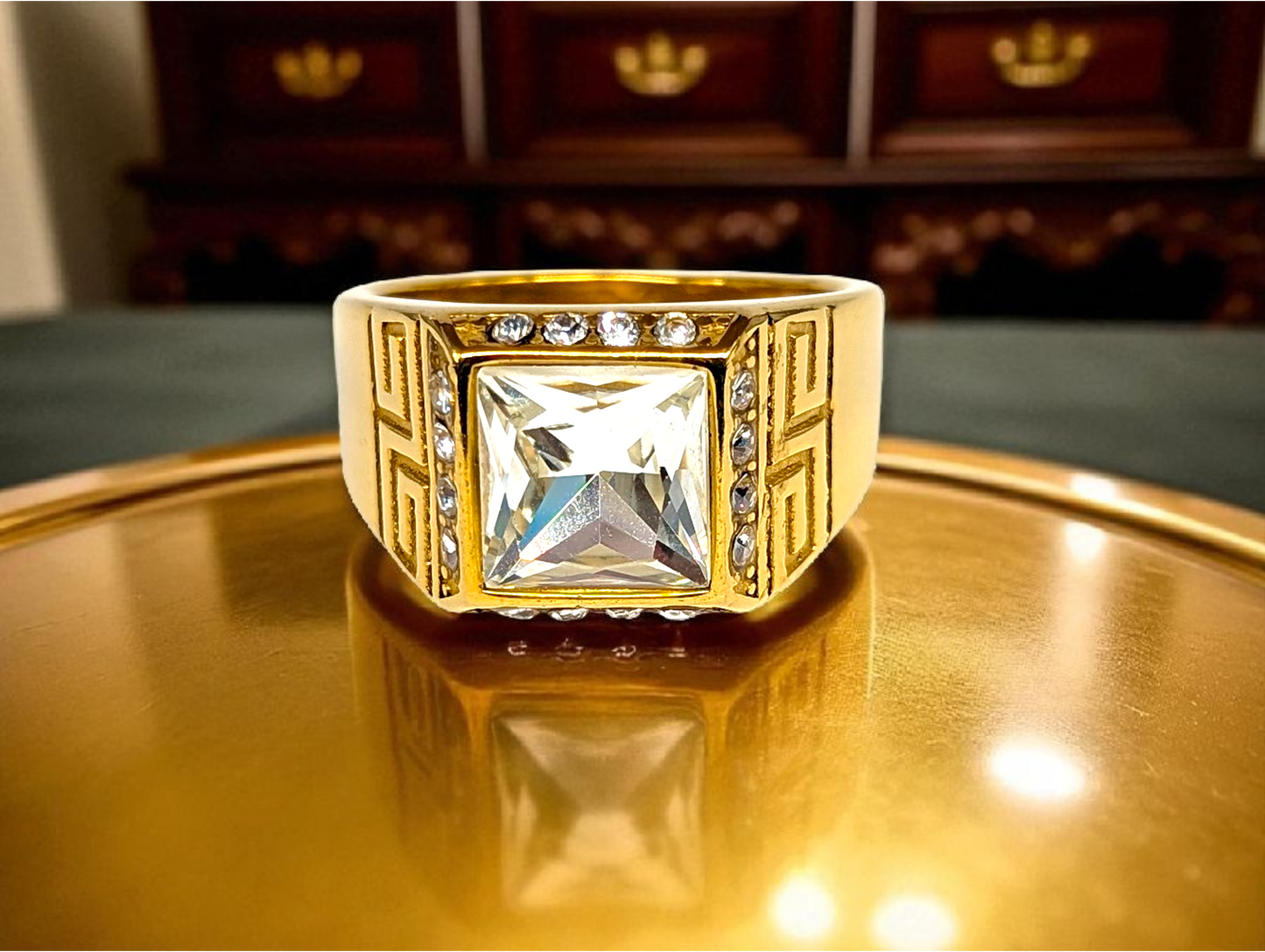 Olympian Brilliance: Gold Ring with Square-Cut Gemstone