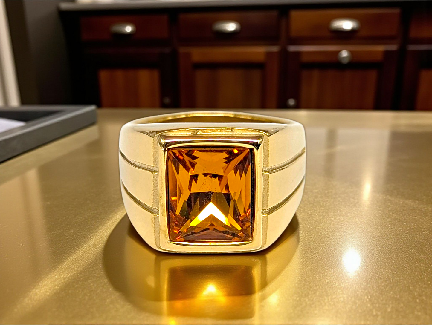 Gold-Tone Ring with Amber Gemstone