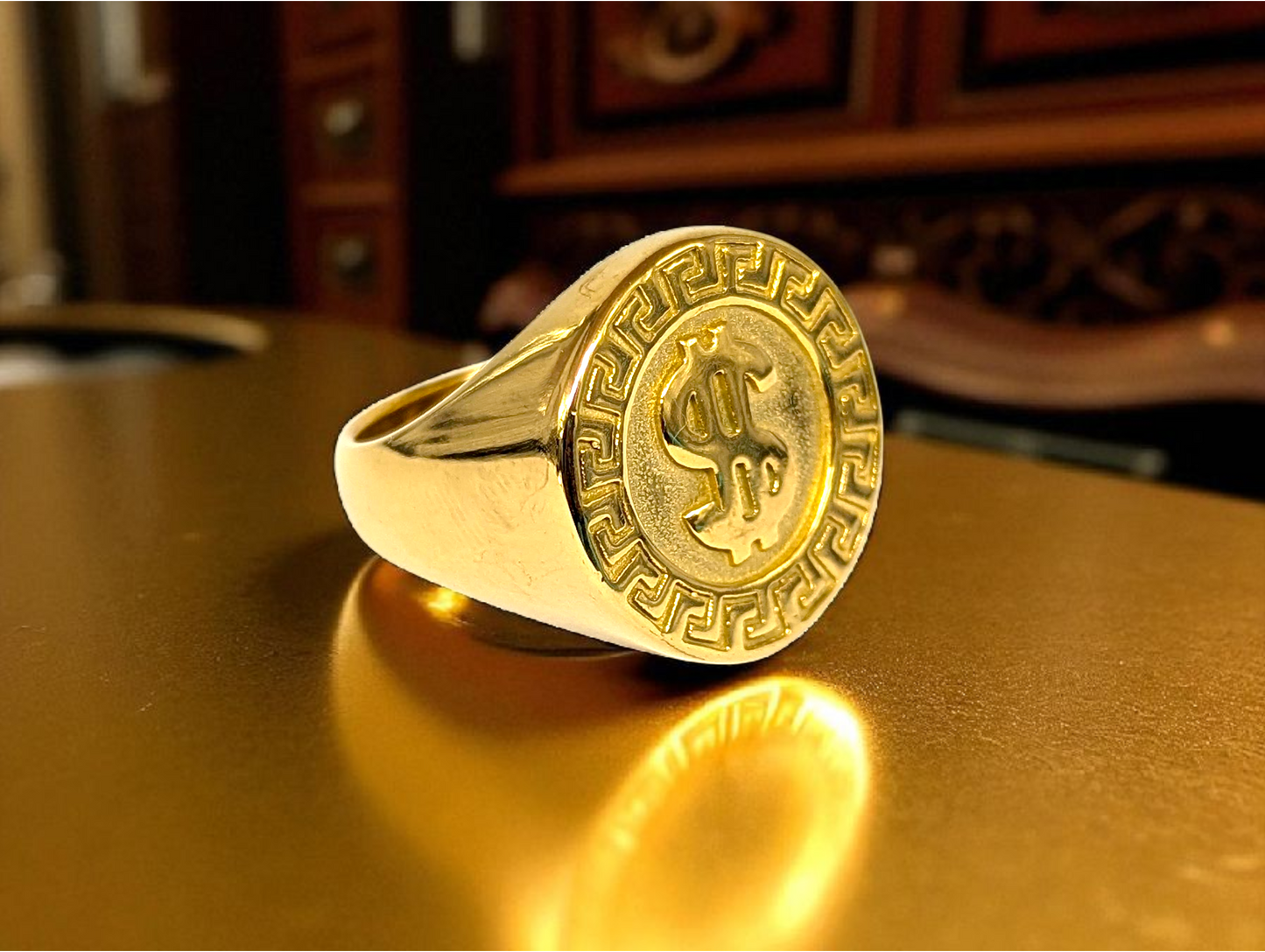 Power & Prestige: Gold-Tone Ring with Embossed Dollar Emblem