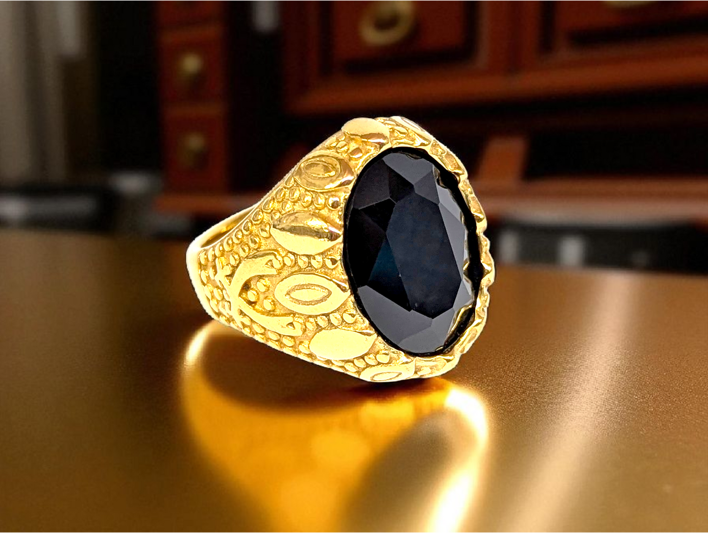 Obsidian Majesty: Gold Ring with Black Gemstone