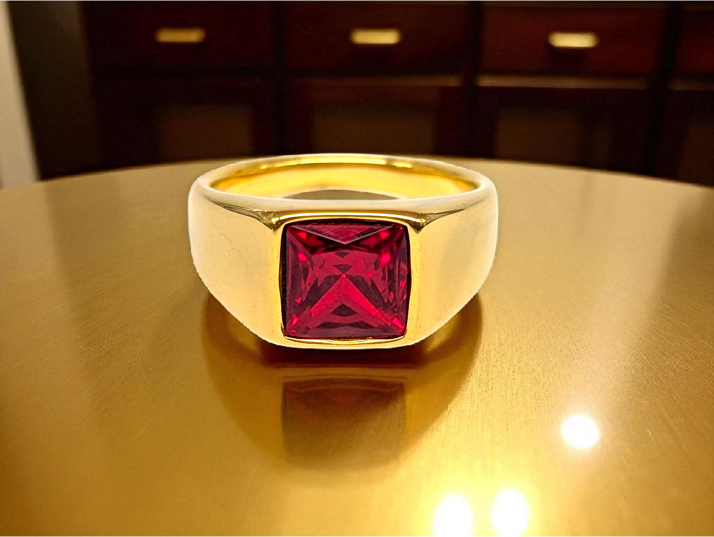 Crimson Prestige: Gold Ring with Square Red Gemstone