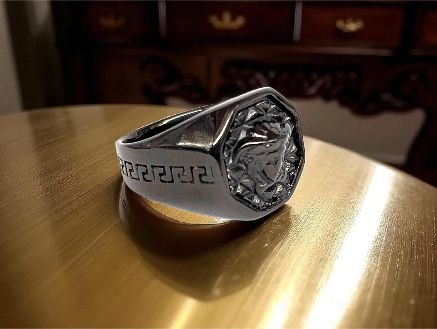 Mythic Power: Black Ceramic Ring with Medusa Emblem