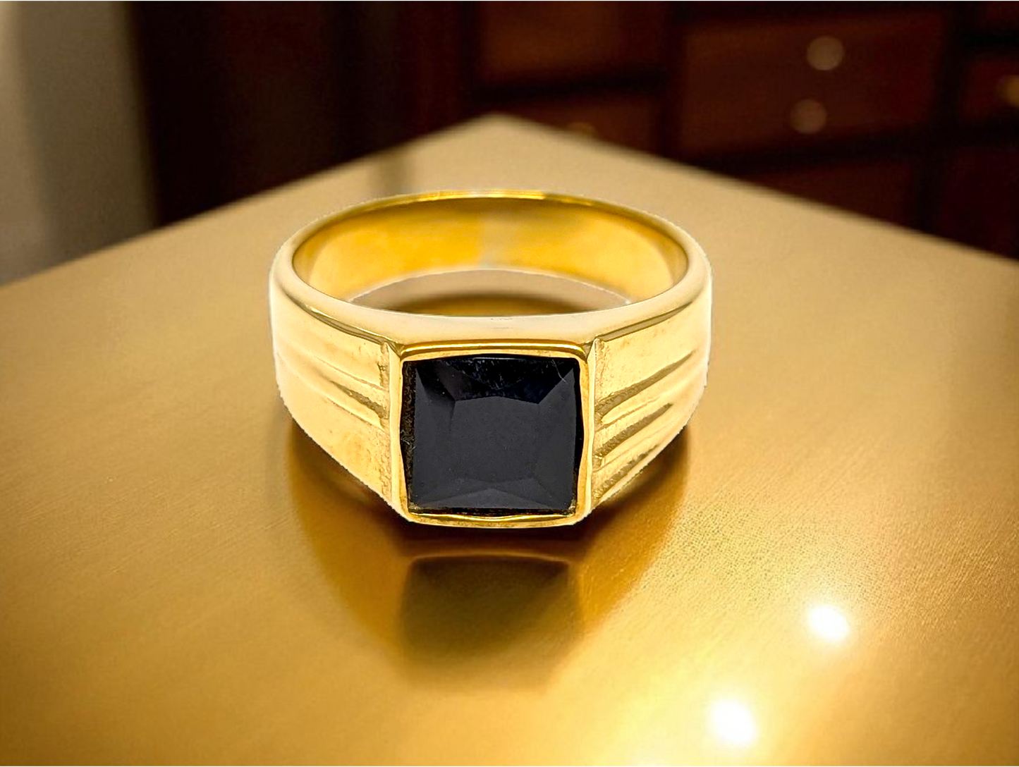 Obsidian Luxe: Gold Ring with Black Gemstone