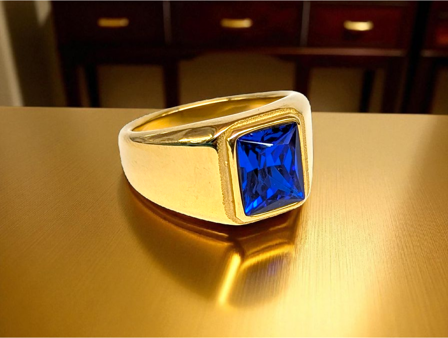 Sapphire Bold: Gold Ring with Blue Gemstone